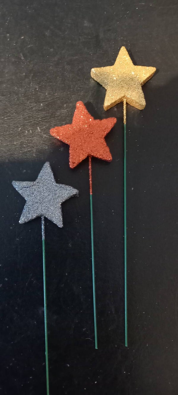 ster op stok met glitters