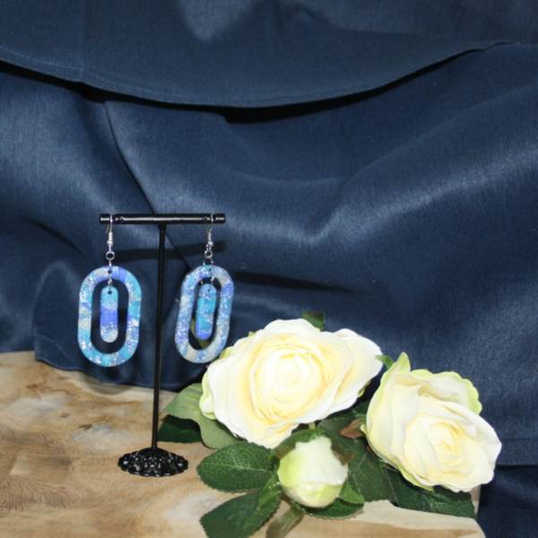 Unieke ovale oorbellen in blauw/zilver tint