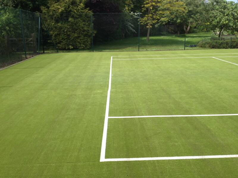 Synthetic carpet cleaning and renovation