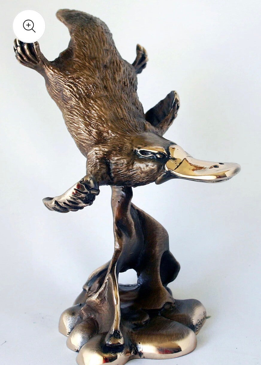 PLATYPUS DIVING ON A BASE