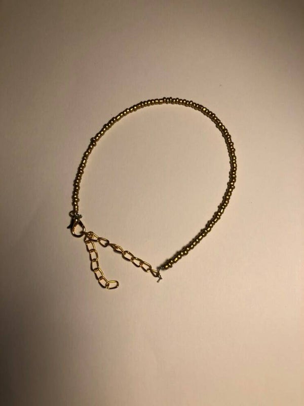 Goud enkelbandje