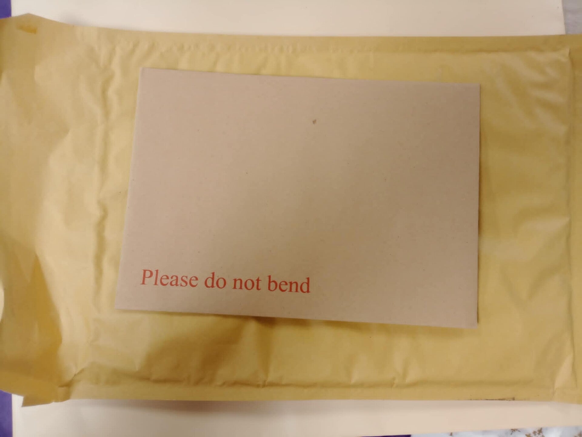 Do not bend envelopes