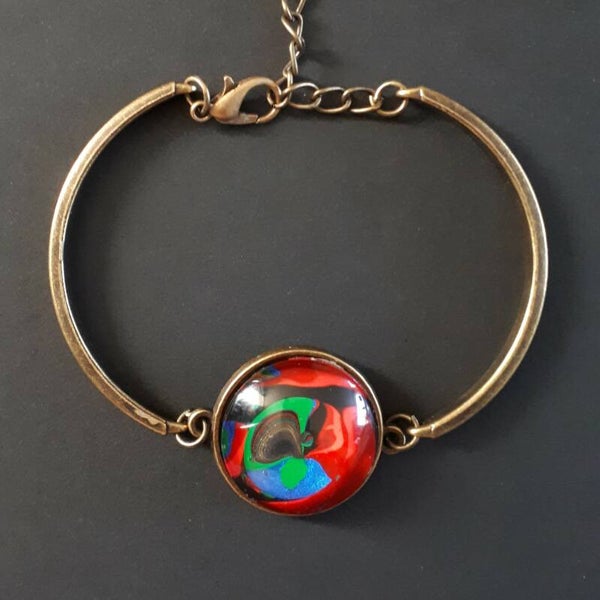 Adjustable bronze-coloured bracelet with unique Multi-coloured stone Product # ArmBCMMcab1