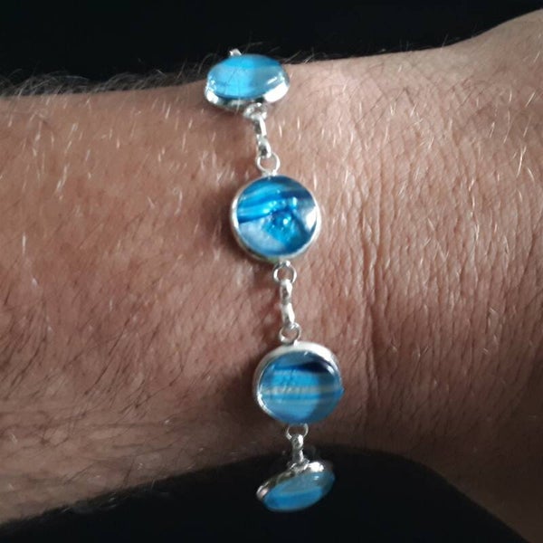 Adjustable silver-coloured charm-style chain bracelet with 6 unique ocean-colored stones Product # ArmSCSB6cab1