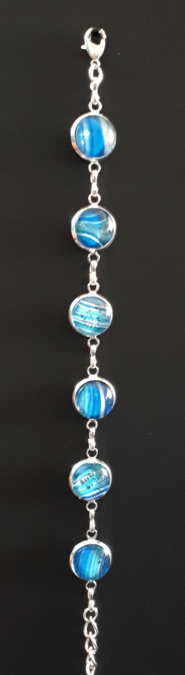 Adjustable silver-coloured charm-style chain bracelet with 6 unique White Water stones Product # ArmSCSWW6cab1