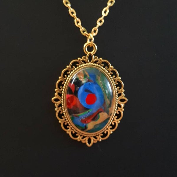 Unique Multi-colored stone in intricate amulet-style oval necklace hanger (with FREE chain) Product # BOMMTcab2
