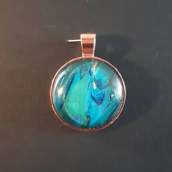 Copper-colored round necklace hanger with unique Deep Sea stone Product # CCMDScab1