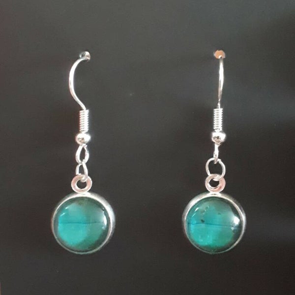 Silver-coloured earrings with unique Deep Sea-coloured stones Product # EarhSCSDScab2