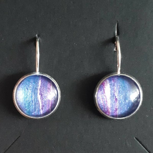 Silver-coloured earrings with unique pink/purple accented stones Product # EarlSCSPcab2