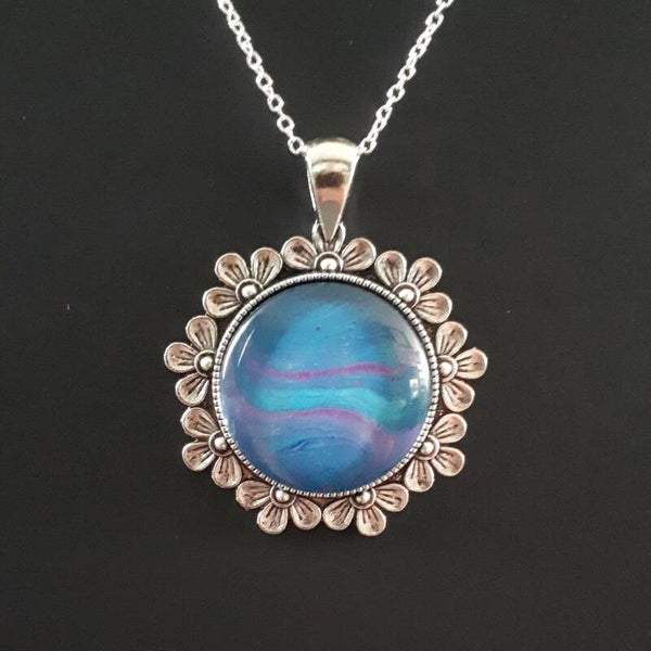 Unique pink/purple accented stone in round Tibetan-style necklace hanger (with FREE chain) Product # SCMBTcab2