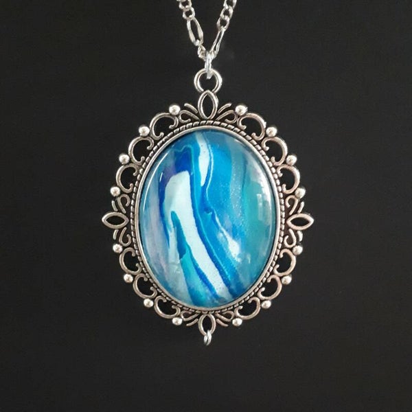 Unique ocean-colored stone in large Tibetan-style oval necklace hanger (with FREE chain) Product # SOXBTcab1
