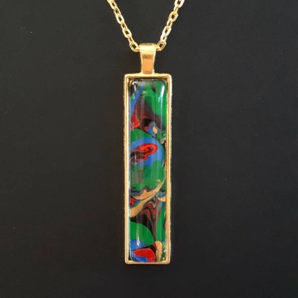 Unique Multi-colored stone in large rectangular hanger (perfect as a keychain or a necklace hanger) Product # keyGRLMcab1