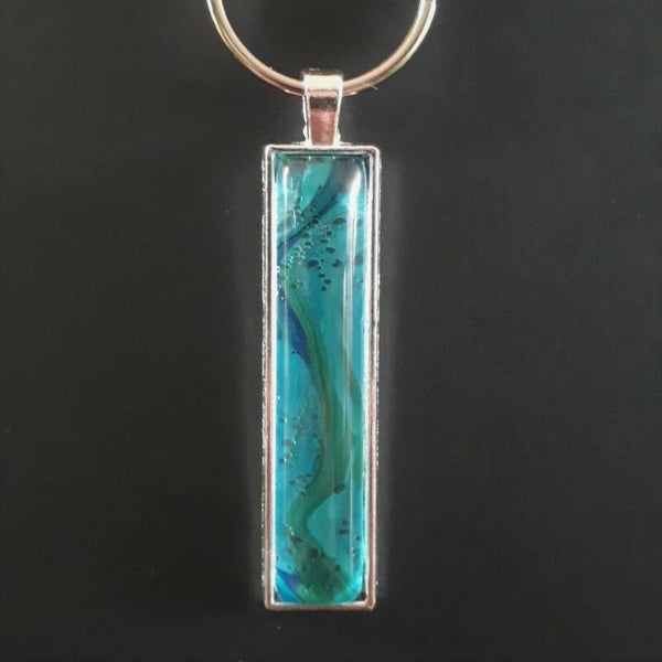 Silver-coloured keychain hanger with unique Deep Sea-coloured stone Product # keySRLDScab2