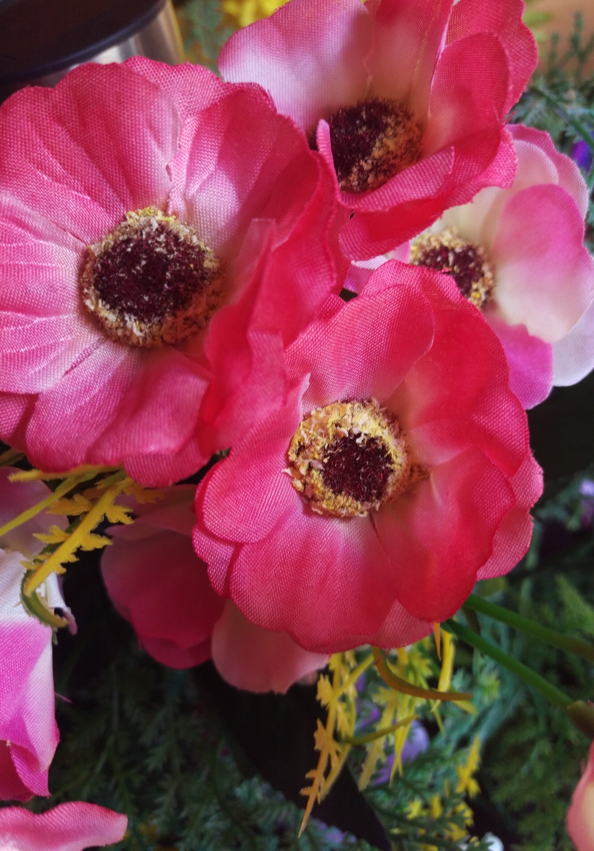 Mixed anemones and variegated ivy hanging basket Bee's Floral boutique