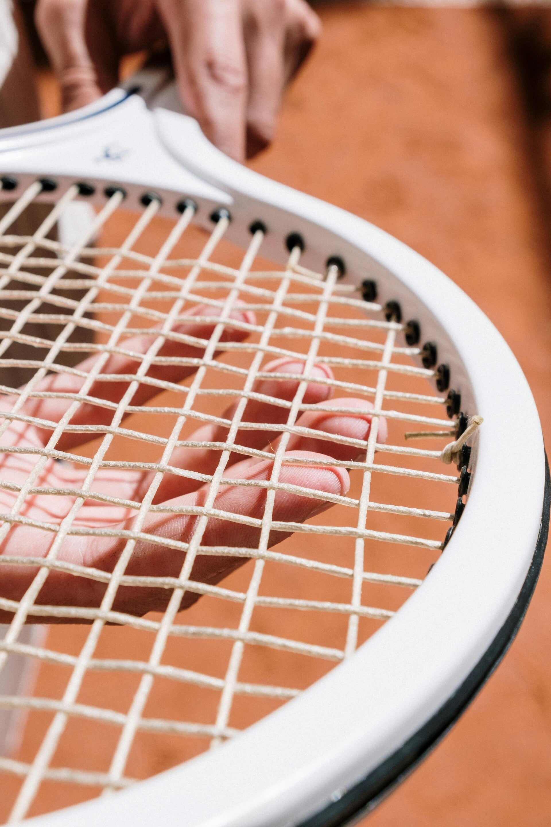 Racquet restringing