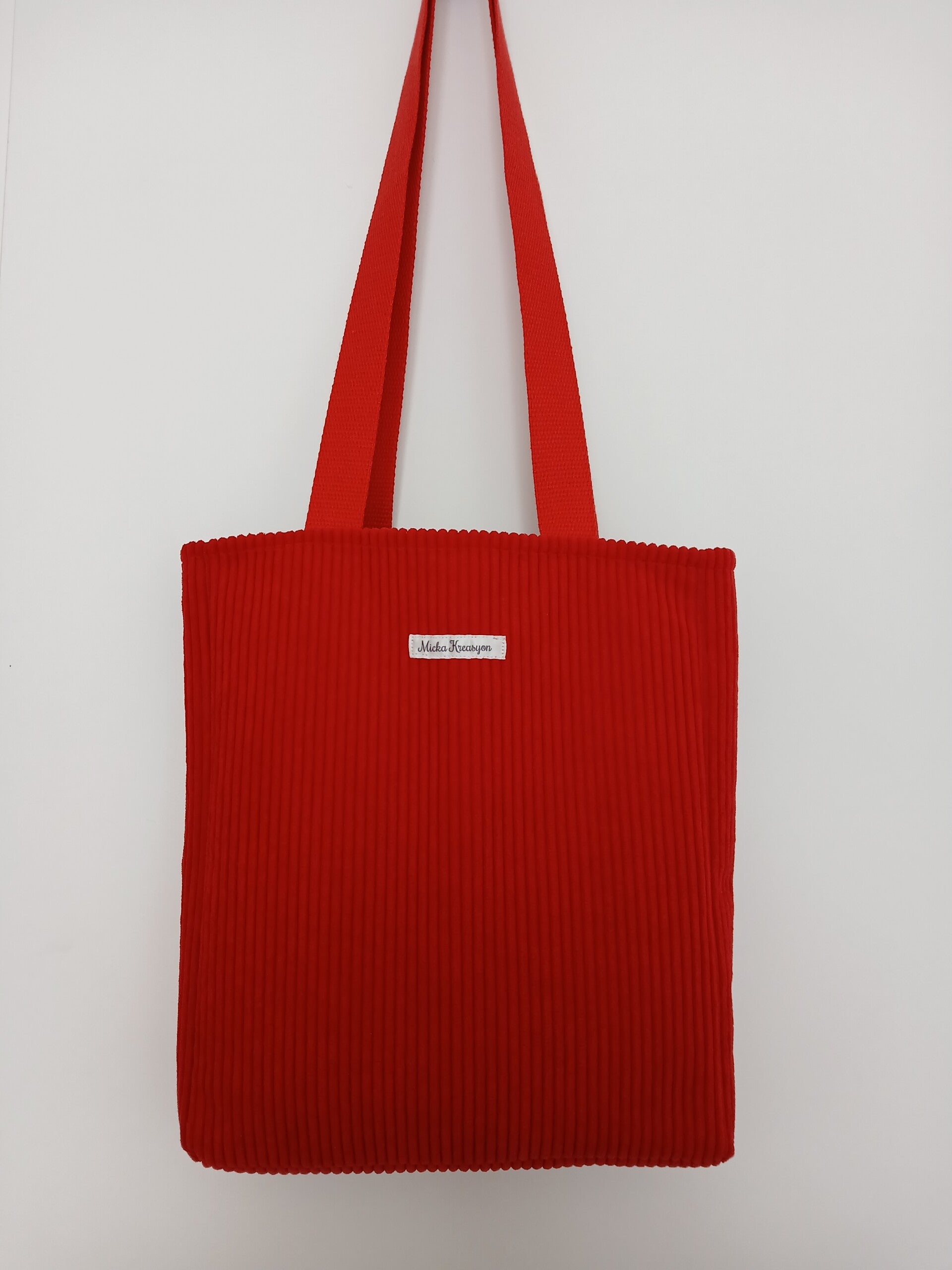 Sac en velours côtelé rouge