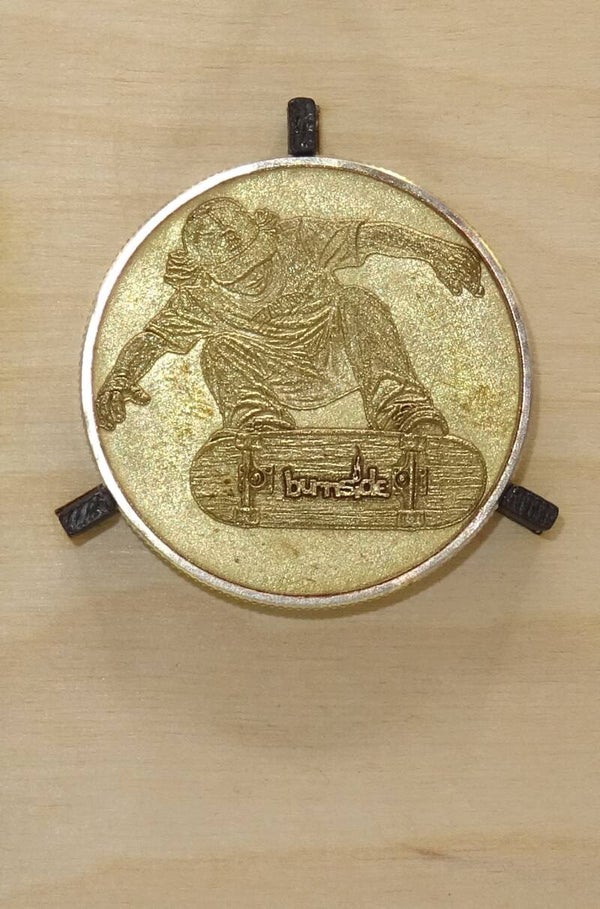 Messing munt 40 mm Skateborder