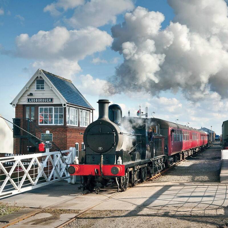 Steam train pulling into ludborough station