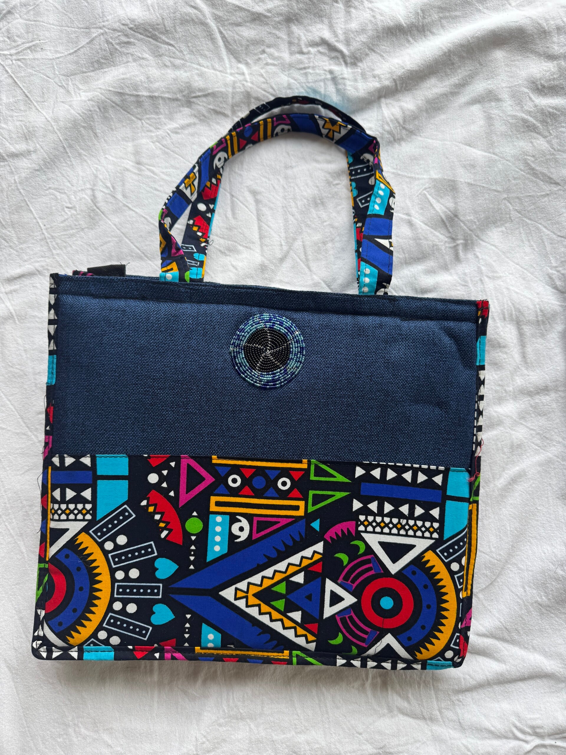 Blue Handbag with Ankara print and beads.