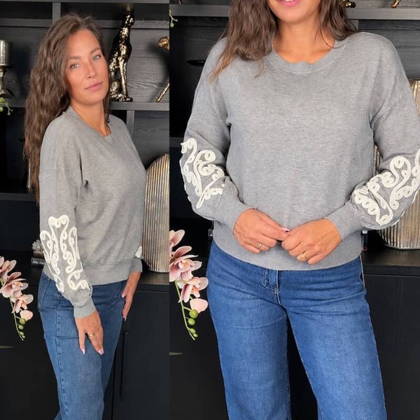 Sweater met statement mouwen