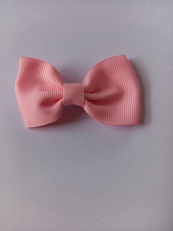 Een klein roze haarschuifje ong. 6 cm groot