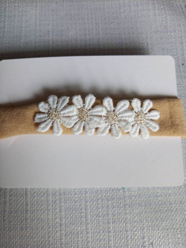 Zandkleurig nylon haarbandje