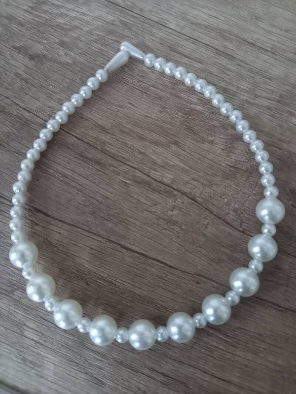 Een harde parel haarband