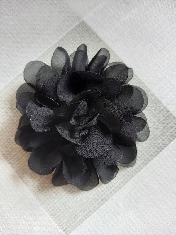 Haarschuifje met een zwarte bloem