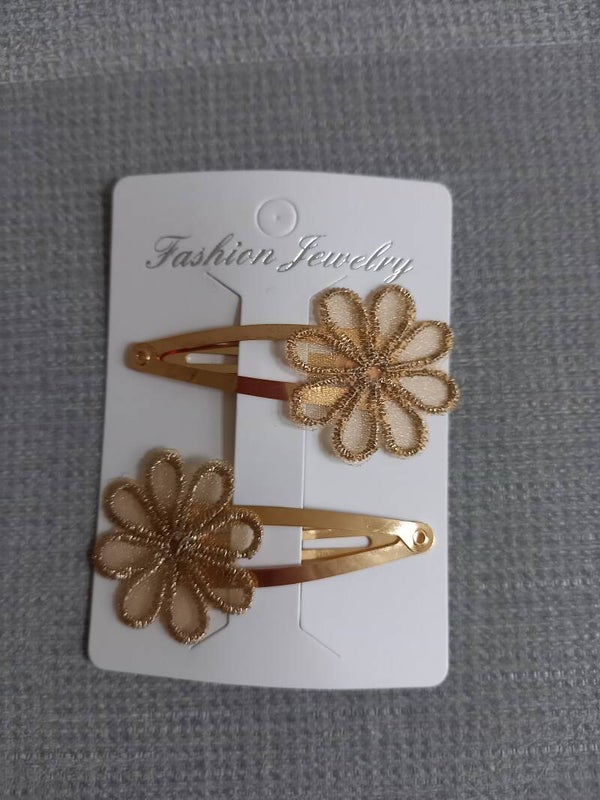 Goud kleurig haarknipje