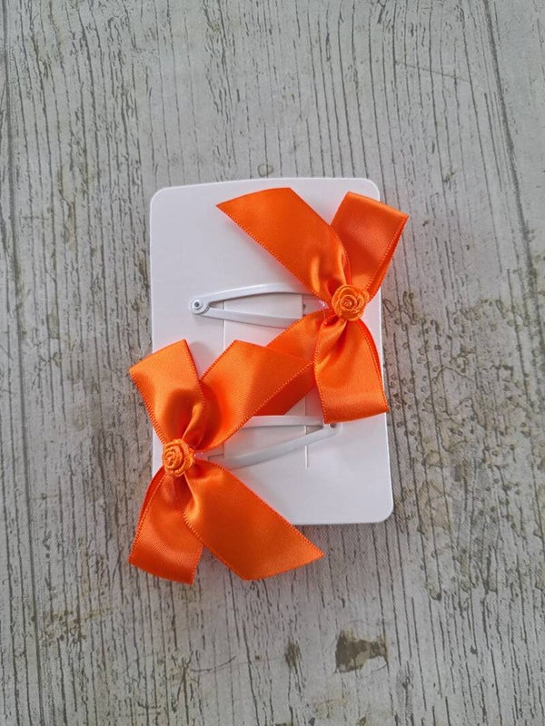 Haarknipjes met oranje strik