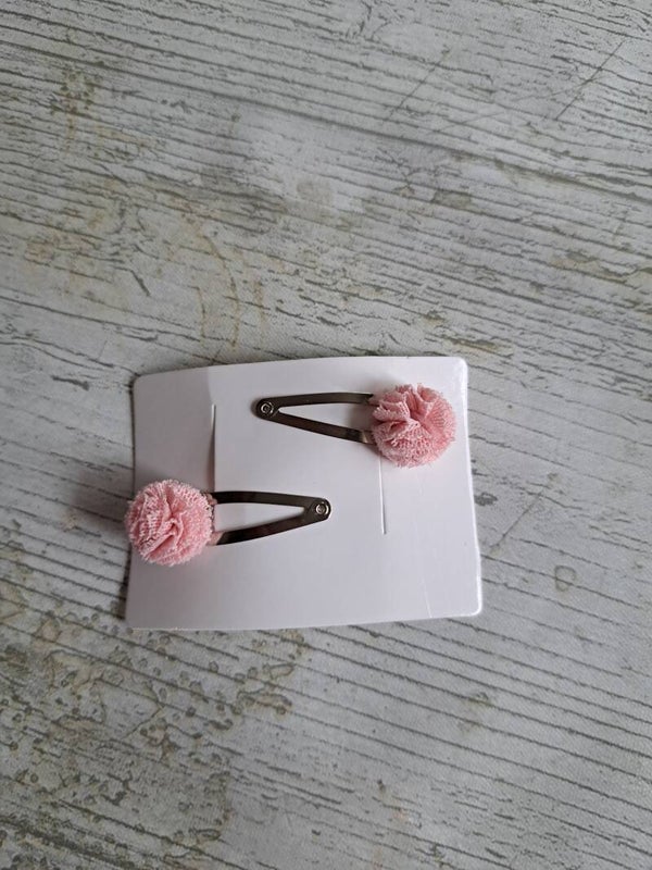 Haarknipjes met een oud roze pompoentje