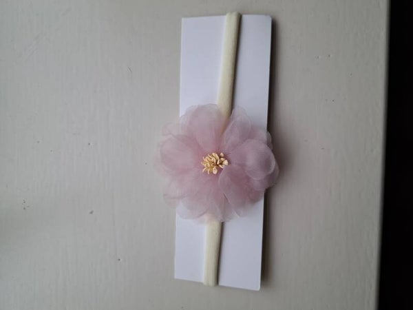 Haarbandje met roze bloem