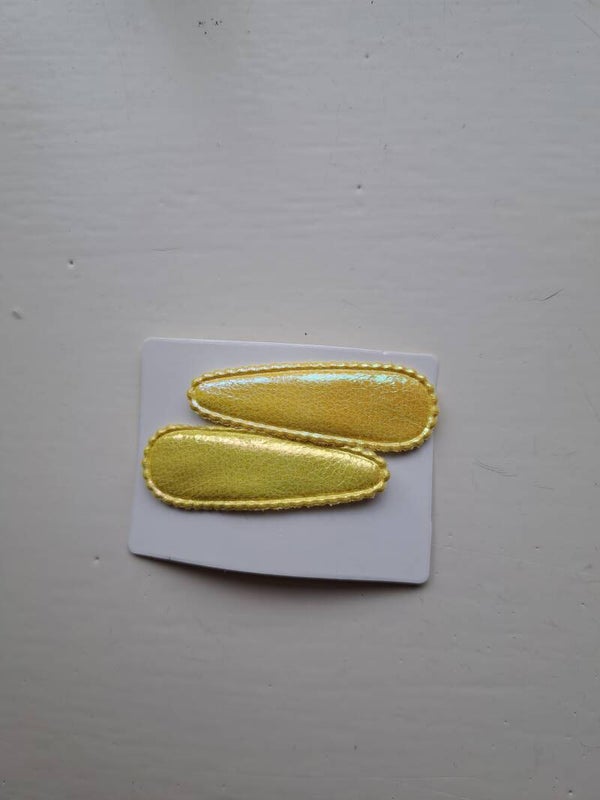 Gele haarknipjes met een laagje organza