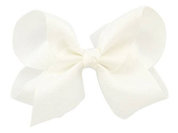 Een groot haarschuifje met een witte strik