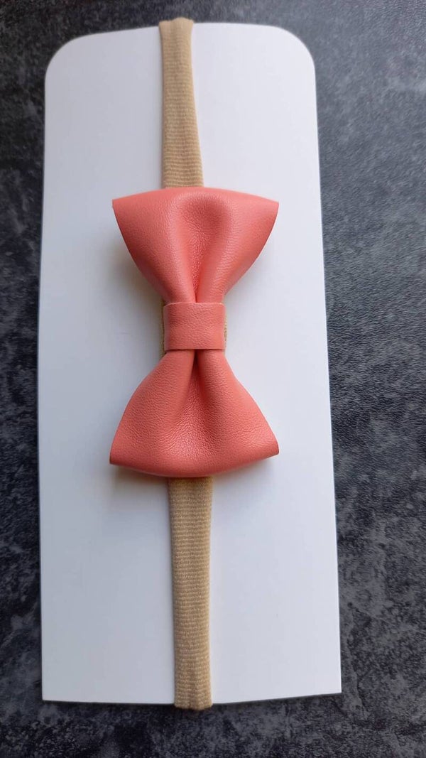Taupe nylon haarbandje met strik