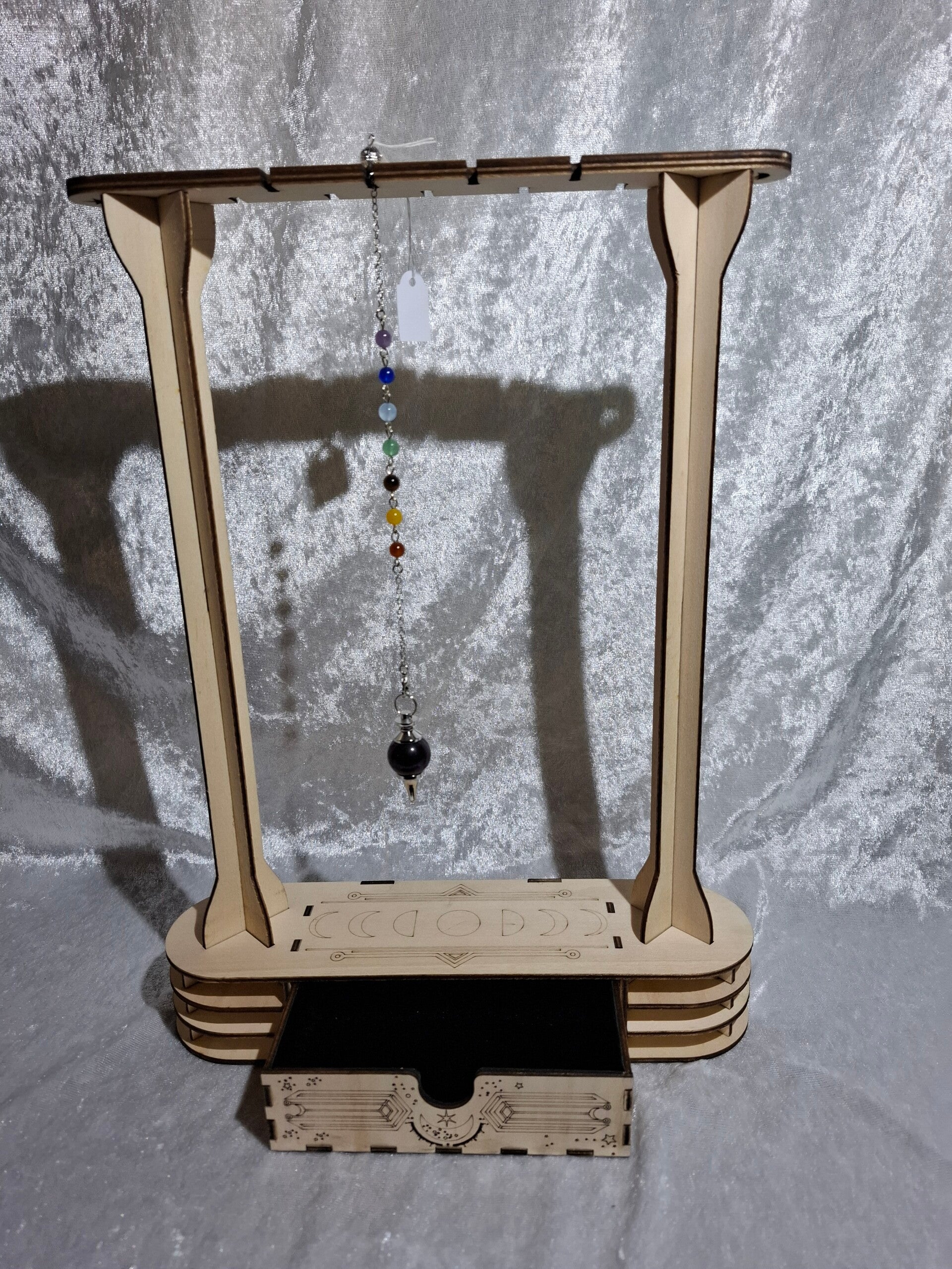 Support à pendule divinatoire