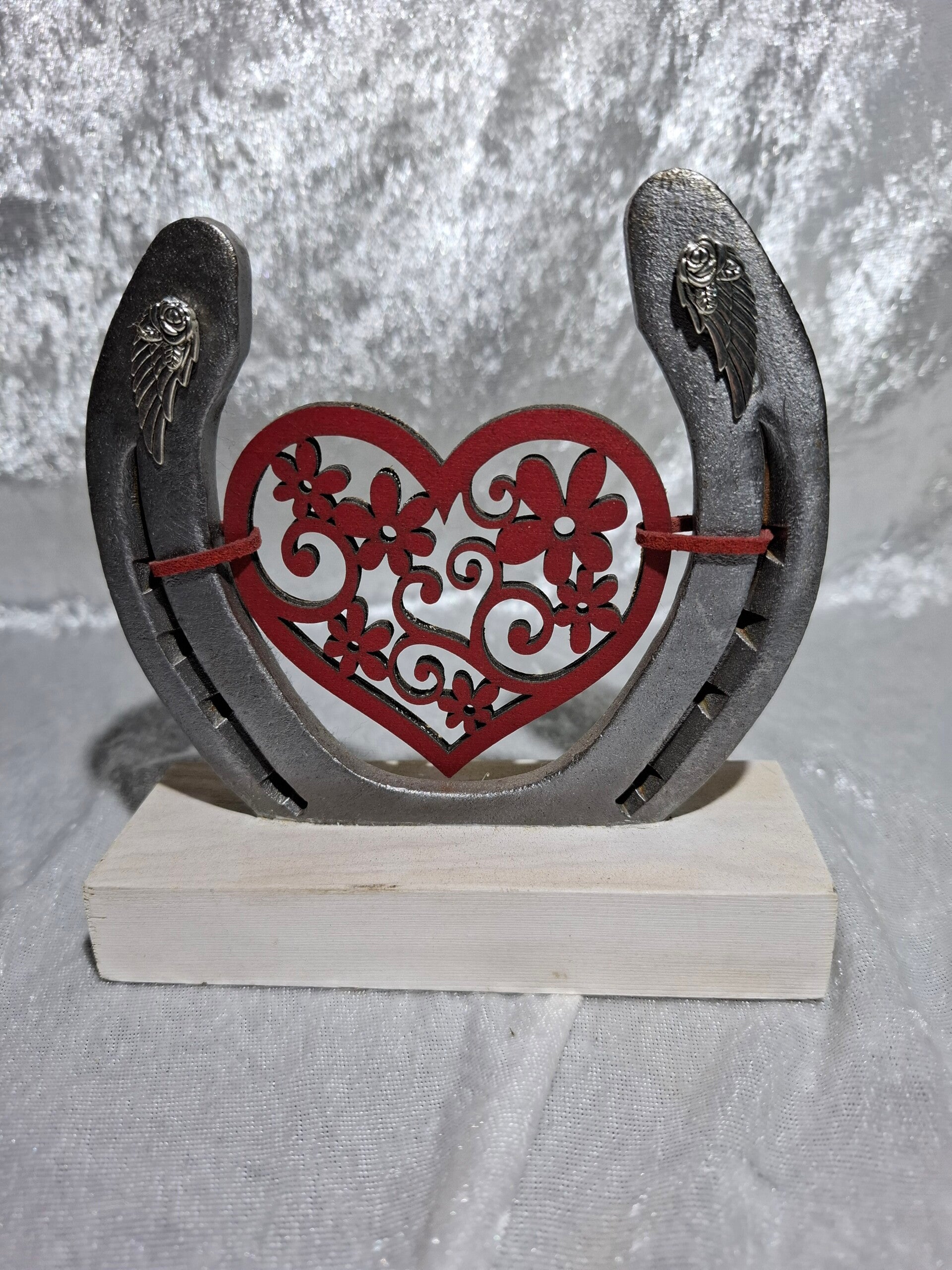 Fer sur socle coeur fleurs
