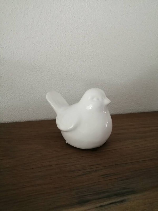 Keramische witte geglazuurde vogel