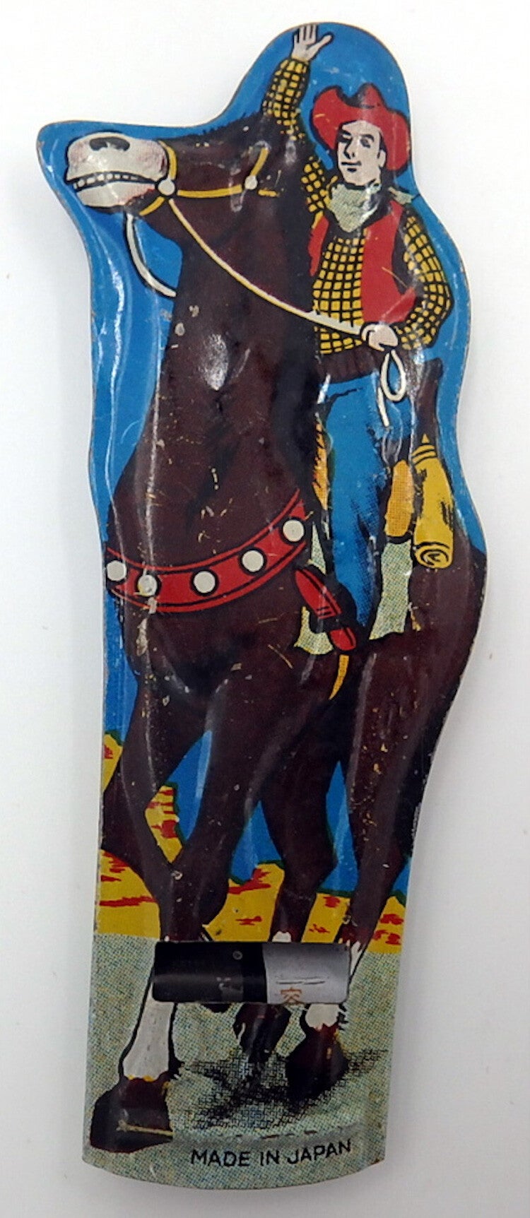 Vintage Tin Japanese Cowboy on Horse Whistle-Blue Background