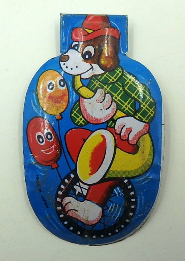 50's-60's Vintage Japanese Tin Clicker-Dog on Unicycle Playing Saxophone
