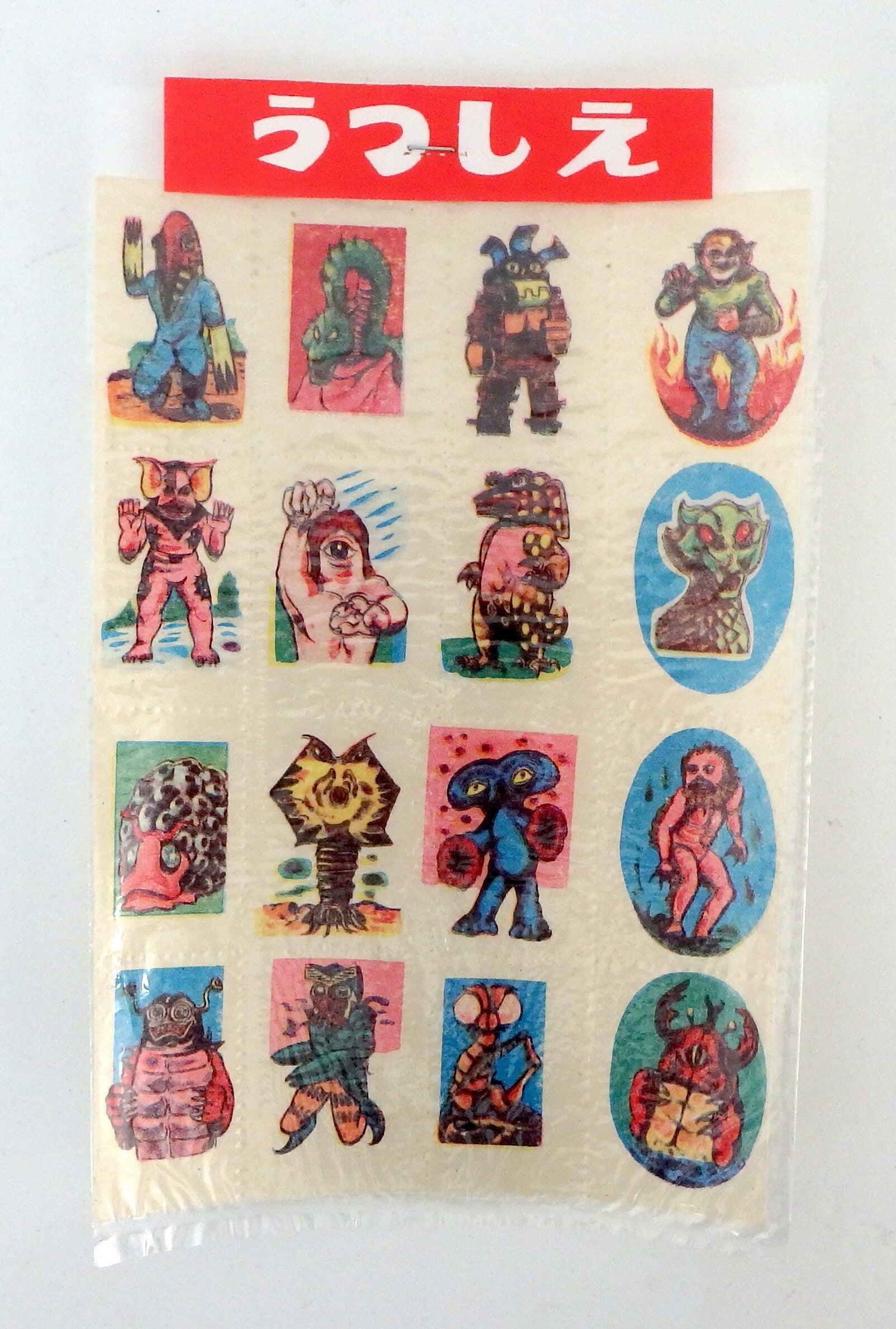 Twelve Vintage Japanese Kaiju Monster Water Decals in Original Header Bag-A