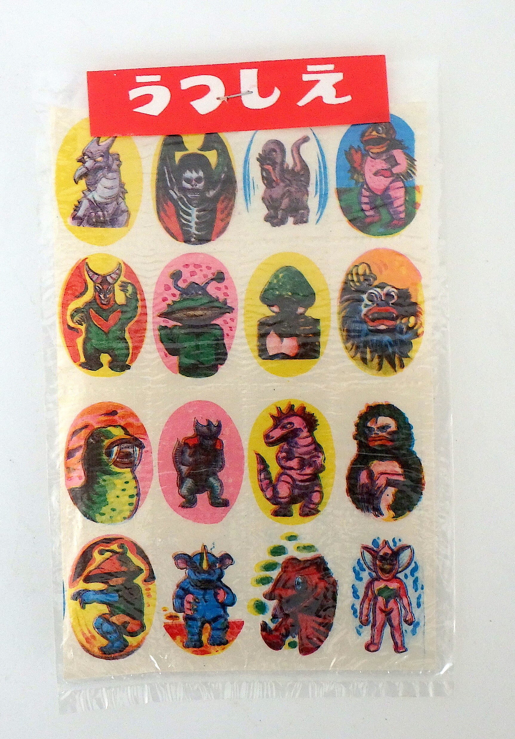 Twelve Vintage Japanese Kaiju Monster Water Decals in Original Header Bag -B