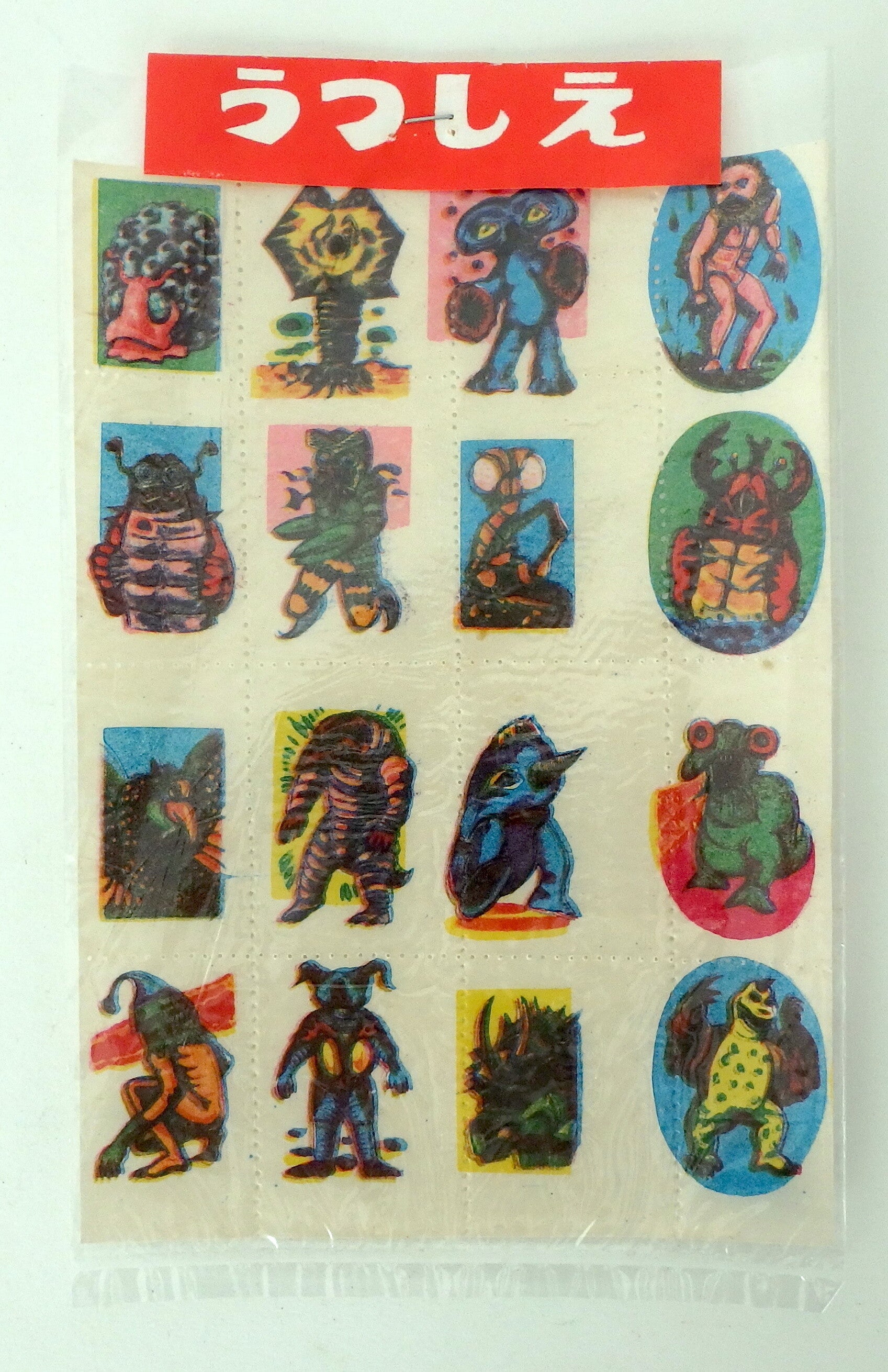 Twelve Vintage Japanese Kaiju Monster Water Decals in Original Header Bag -C