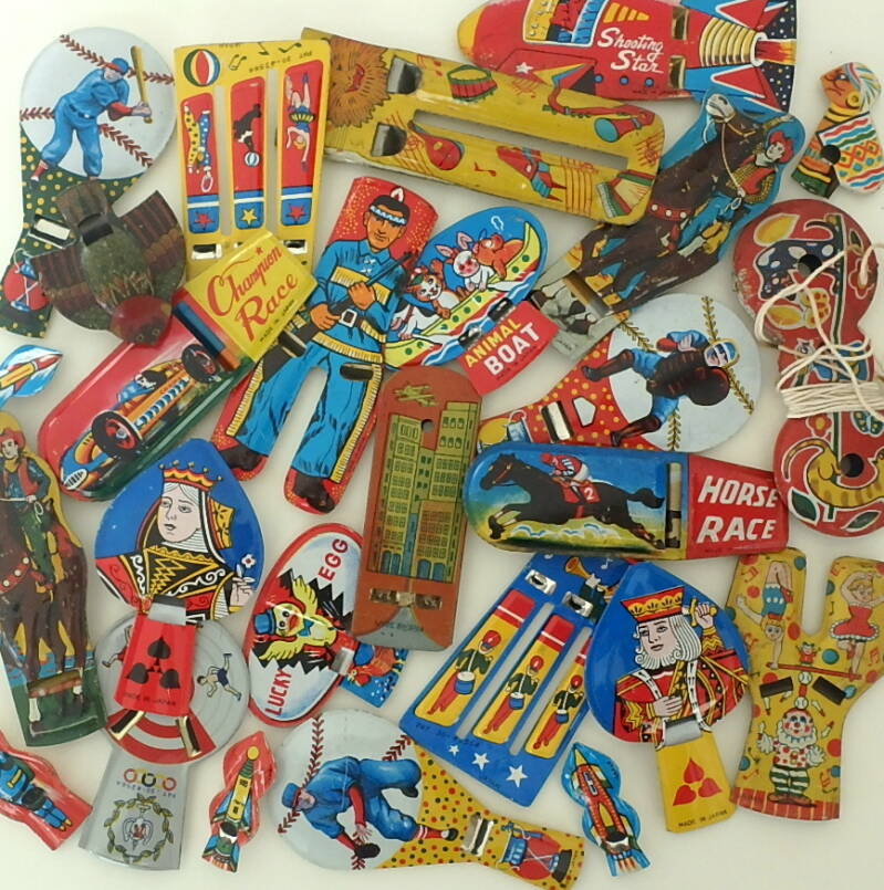 vintage Japanese figural tin whistles, baseball,cowboy, robot, rocket, animals, clowns