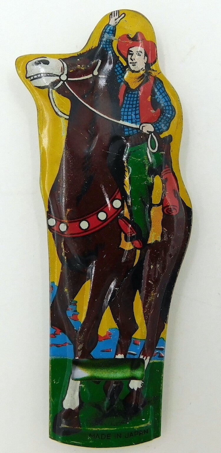 Vintage Tin Japanese Cowboy on Horse Whistle- Yellow Background