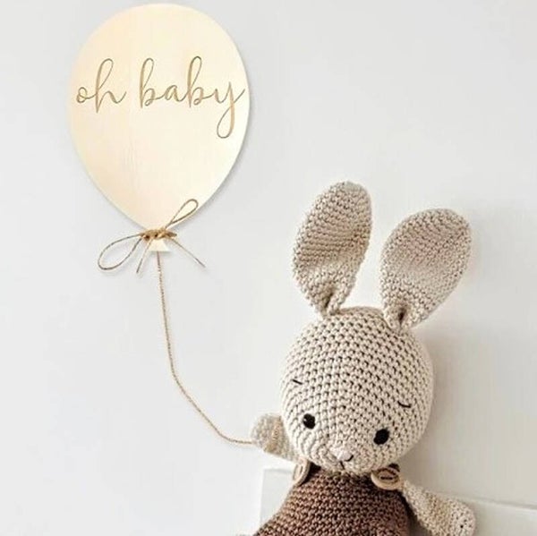 Houten ballon met de tekst Oh Baby