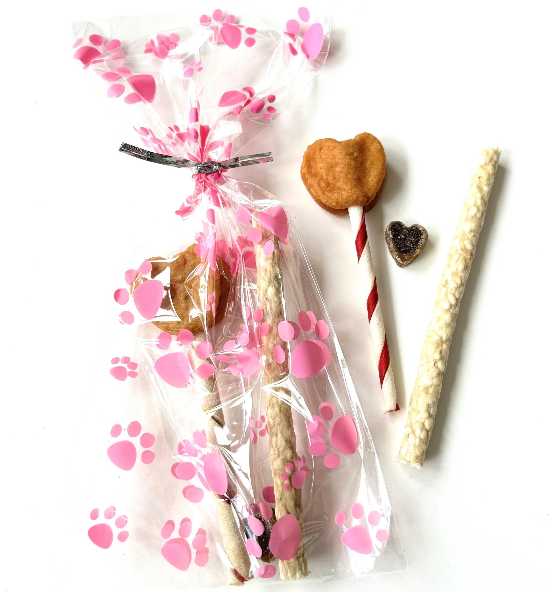 Honden lolly hart in cellofaan zakje met roze honden pootjes