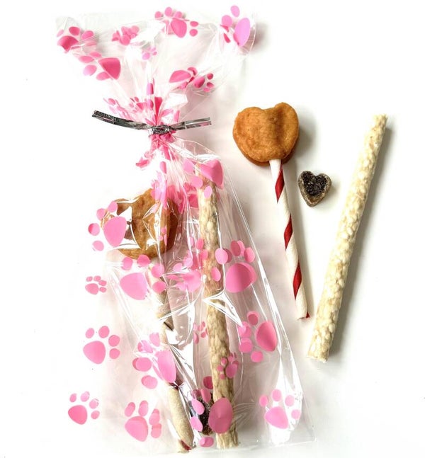 Honden lolly hart in cellofaan zakje met roze honden pootjes