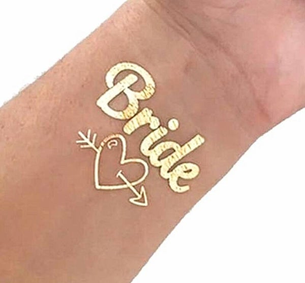 Goudkleurige tatoeage Bride Tribe