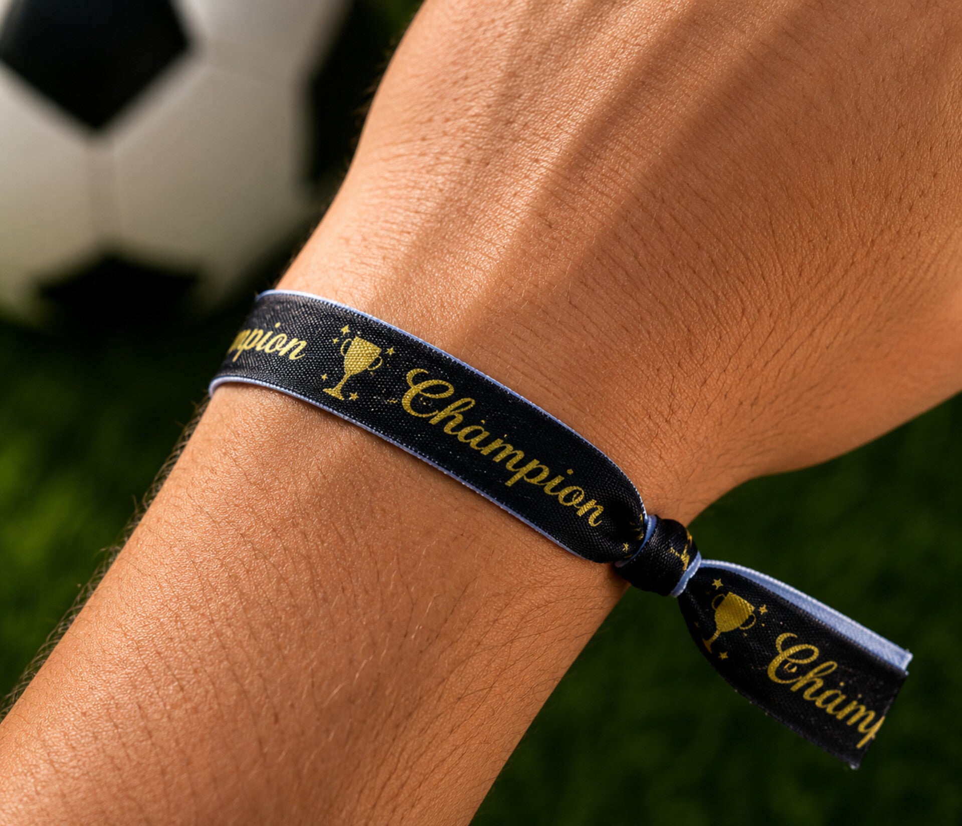 Elastische armband/haarelastiek Champion zwart met goud